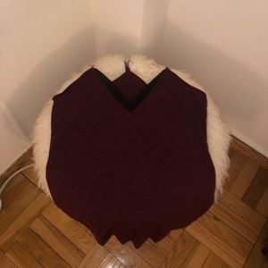 Racer back style burgundy top with black v neck